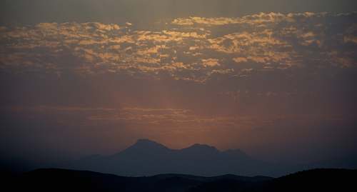 outdoors silhouette of a mountain at twilight dusk