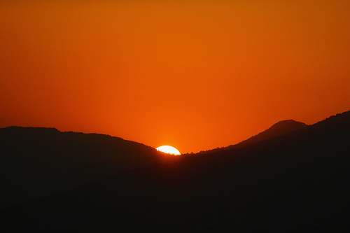 outdoors silhouette of mountains during golden hour dawn