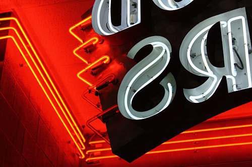 sign red and white neon lights light