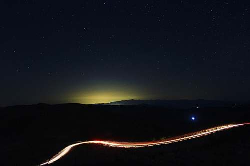 light time lapse photography of road at night time road
