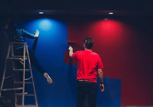 human man and woman painting wall person