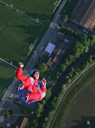 person woman on flip position sky diving human
