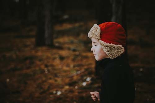 human boy with close eyes on vignette photography people