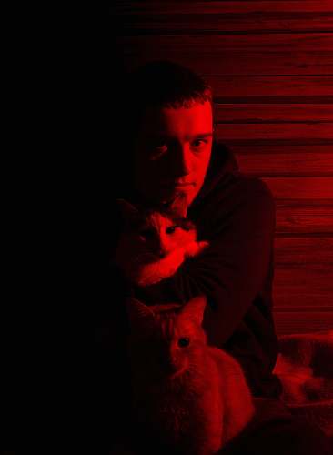 human man hugging white cat animal