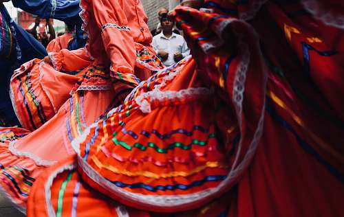 human man standing behind dancers people