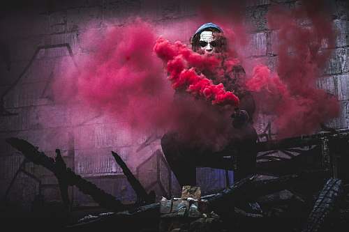human man with pink smoke digital wallpaper people