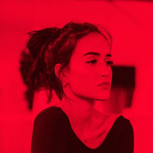 human portrait photograph of woman in black shirt people