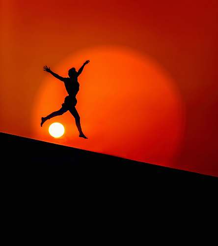 red silhouette of jumping person human