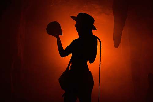human silhouette photo of cowgirl apparel