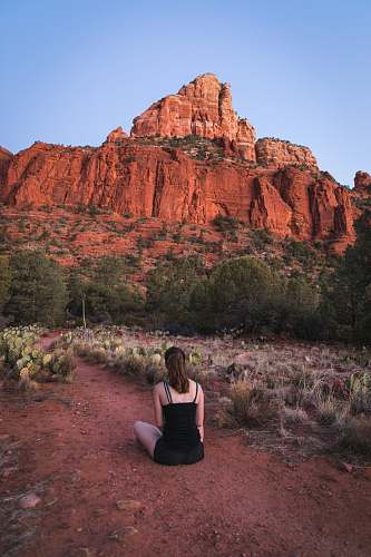 human woman sitting on dust nature