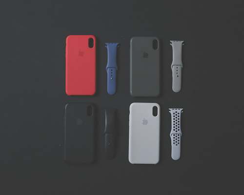electronics four assorted-color iPhone Xs cases and sports bands mobile phone