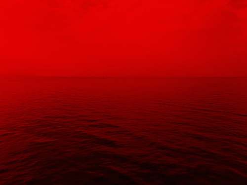 nature photo of ocean with red lights sky