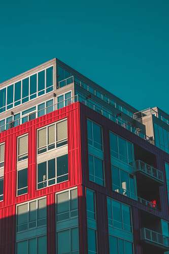 building red and gray concrete building office building