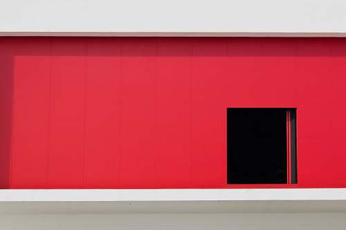 wall red building with door spain
