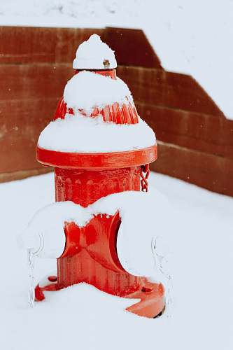 snow red fire hydrant covered with snow nature