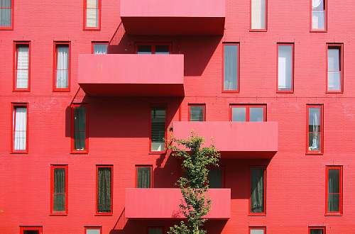balcony red high rise building building