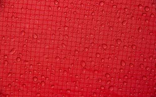 rug red textile text
