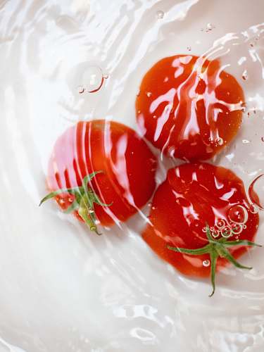 food three red tomatoes in water ketchup