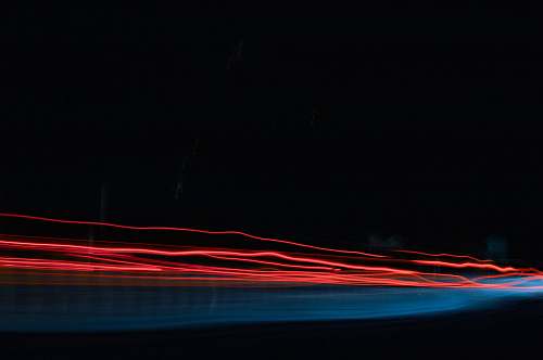 light time lapse photo of red lights line