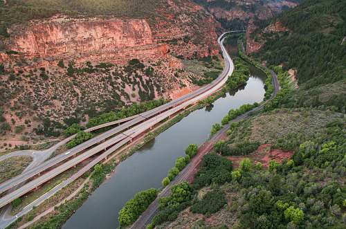 road aerial view of river during daytime water