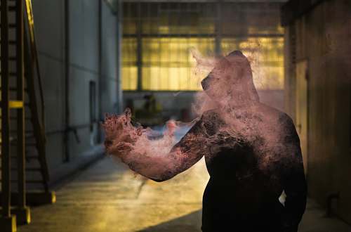germany photo of man turning into dust digital wallpaper smoke