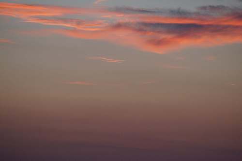 sunset orange clouds on clear sky dusk