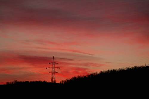 sunset silhouette of transmitter site dusk