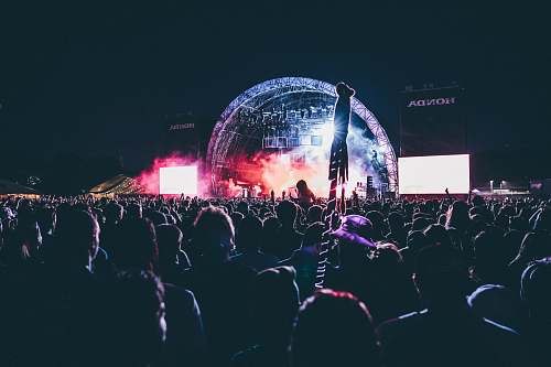 festival photo of crowd of people in a concert crowd