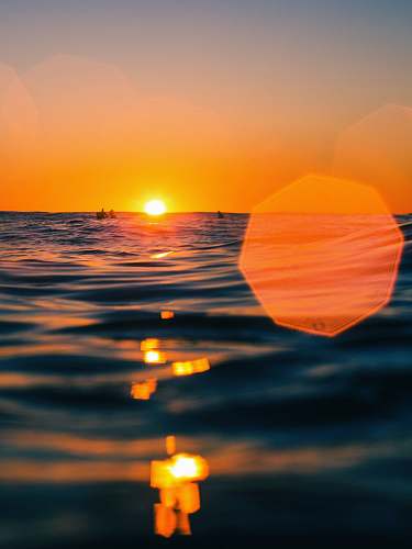 nature body of water during golden hour outdoors