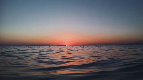sunset sunset in body of water horizon
