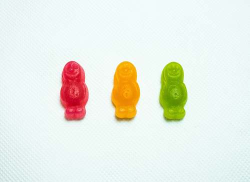 sweets three assorted-colored gummy bears candy