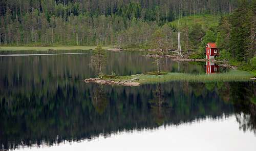 norway red house near body of water during daytime nature