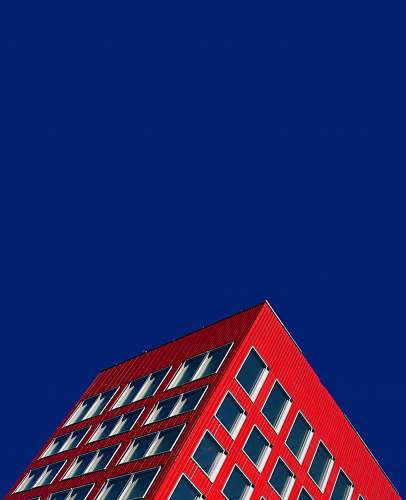 building worm's eyeview of red building zürich
