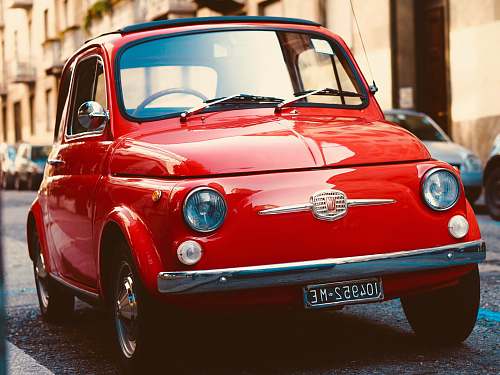 italy closeup photo of red car red