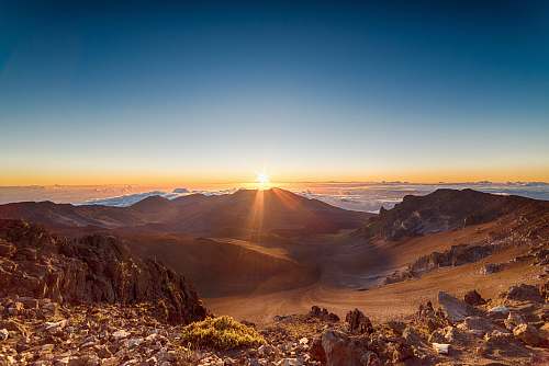 mountain brown mountains during sunrise sunrise