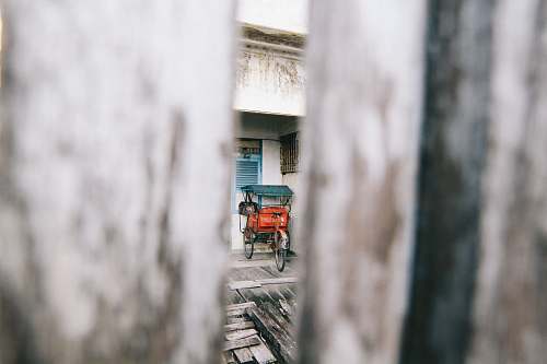indonesia photo of red rickshaw wagon
