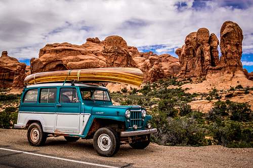 jeep teal and white SUV car