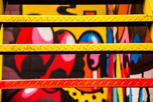 step red and yellow painted metal stairs art