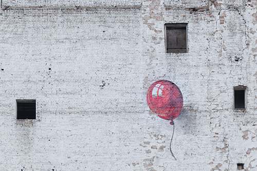 window red balloon wall graffiti poland