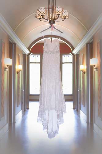 dress white spaghetti strap dress hang on chandelier light