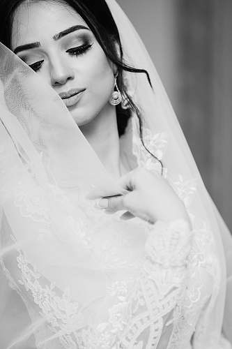 wedding woman in white wedding dress closing eyes bride