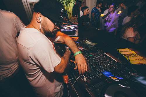 people DJ playing music person