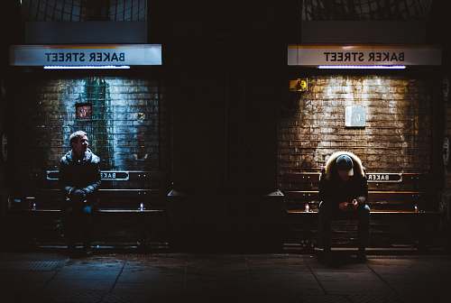 people two men sitting on Baker Street person