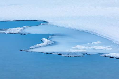 ice white and blue ocean waves blue