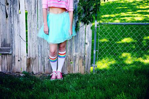 person girl's teal skirt clothing