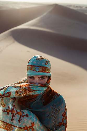 person high-angle of woman walking on desert human