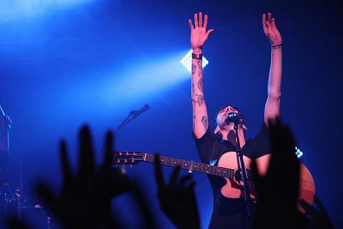 human man raising his hand person