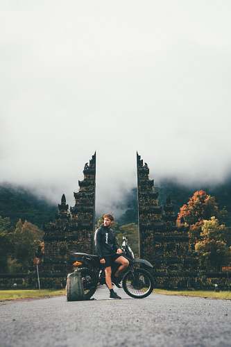 motorcycle man sitting on dirtbike vehicle