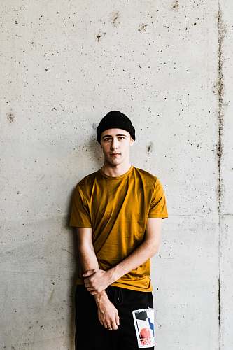person man standing while holding his hand human