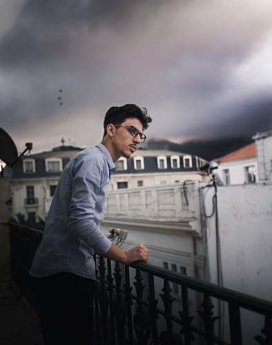 human man wearing blue shirt person